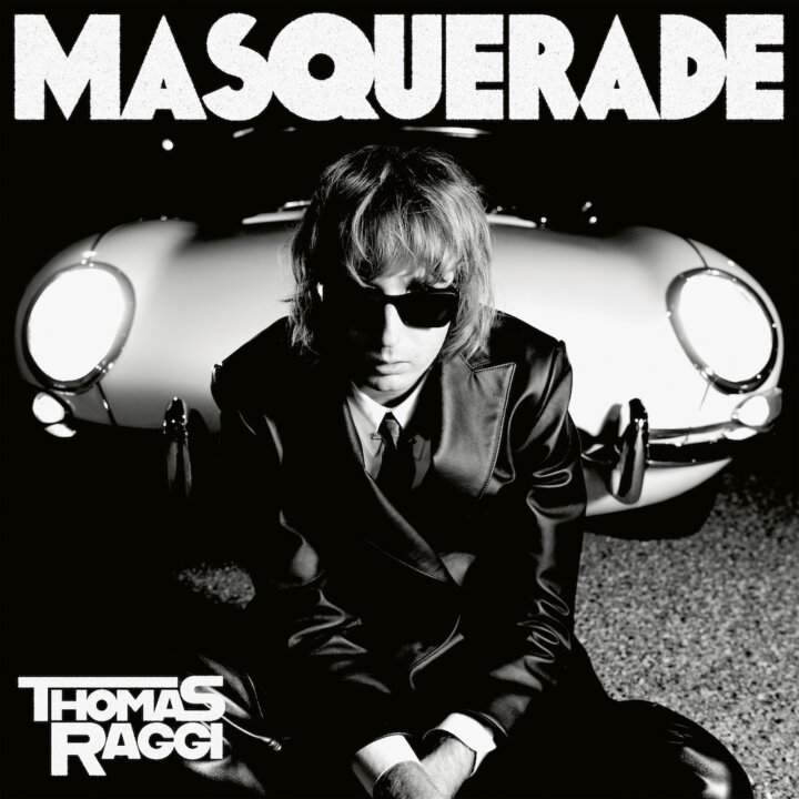 Copertina dell’album Masquerade, il debutto solista di Thomas Raggi prodotto da Tom Morello