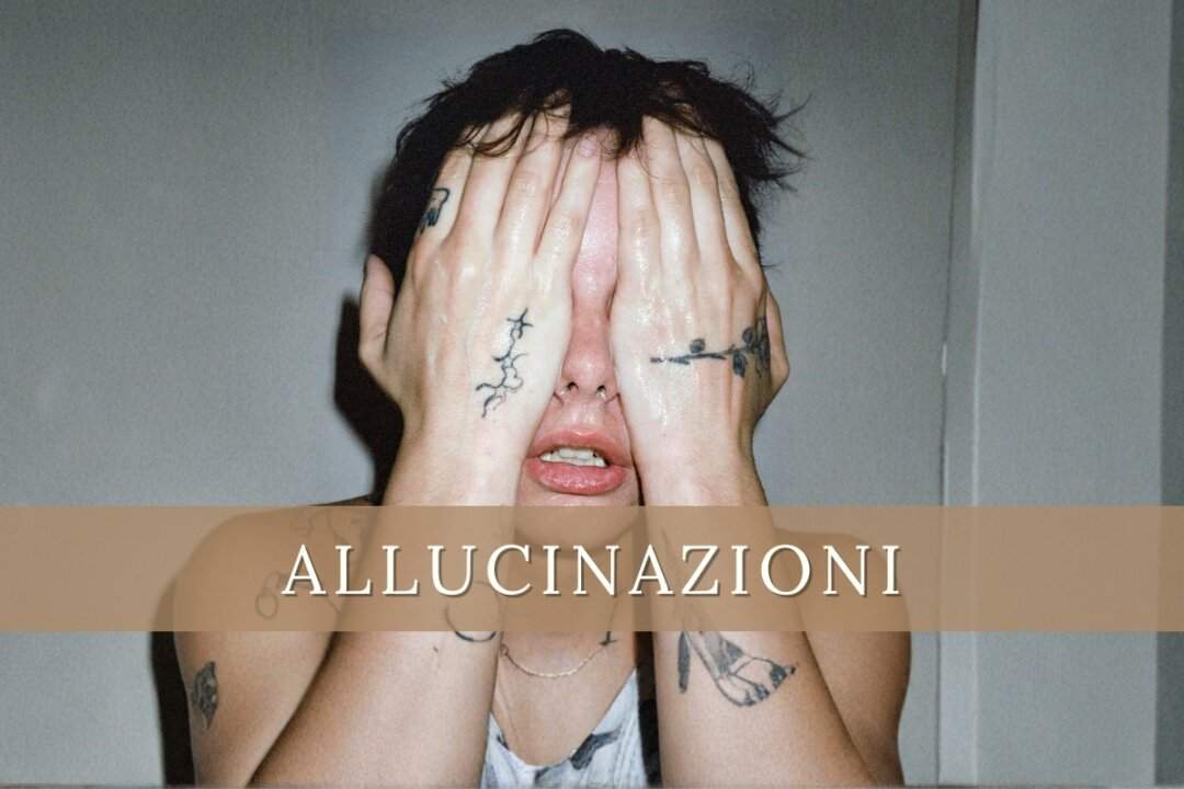 Madame con le mani tatuate a coprire il viso, foto promozionale del brano Allucinazioni dall'album Disincanto