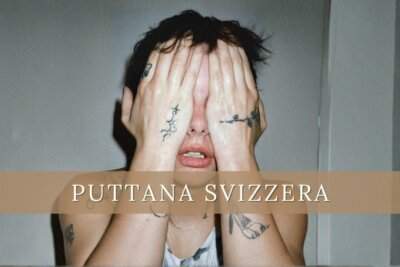 Madame con le mani tatuate sul viso, foto promozionale del brano Puttana Svizzera dall'album Disincanto