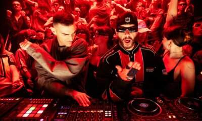 Gabry Ponte e Salmo alla console DJ tra il pubblico nella foto promo di TIK TAK