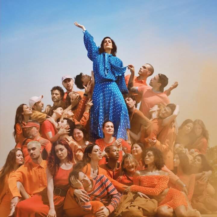 Levante at the center of a human pyramid in the full cover of the new album