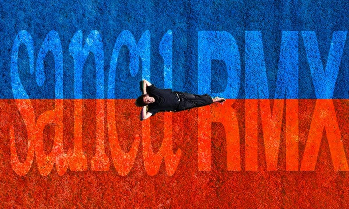 Copertina di Sancu RMX, Nico Arezzo disteso su sfondo blu e arancione