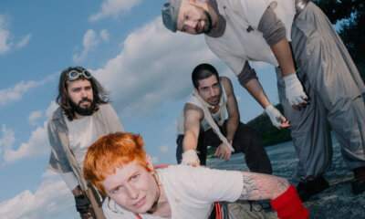 Melancholia, foto di gruppo della band per il singolo Schifo